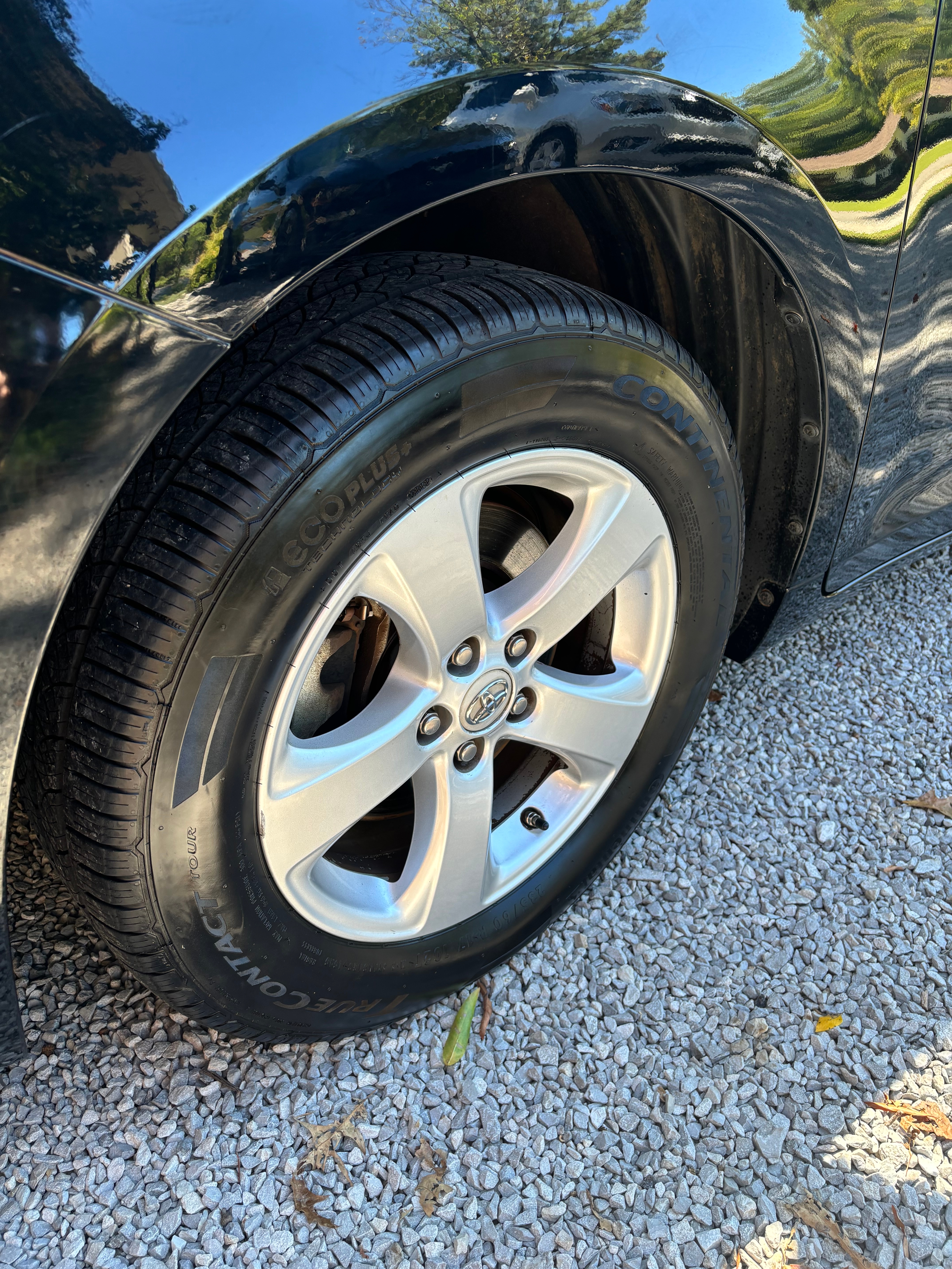 Premium detailing service on white Ford Mustang