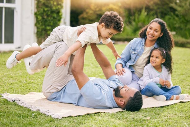 Family enjoying time together while car is being professionally detailed